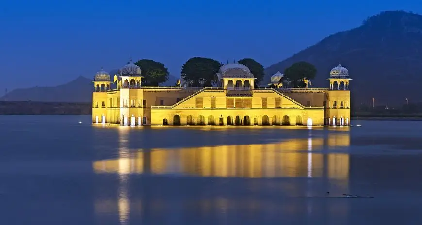 Jal Mahal illuminated at night in Jaipur, Rajasthan.