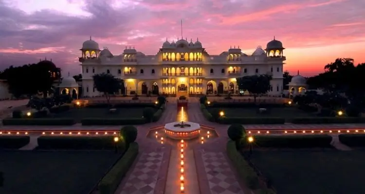 Luxury heritage hotel entrance at sunset in India